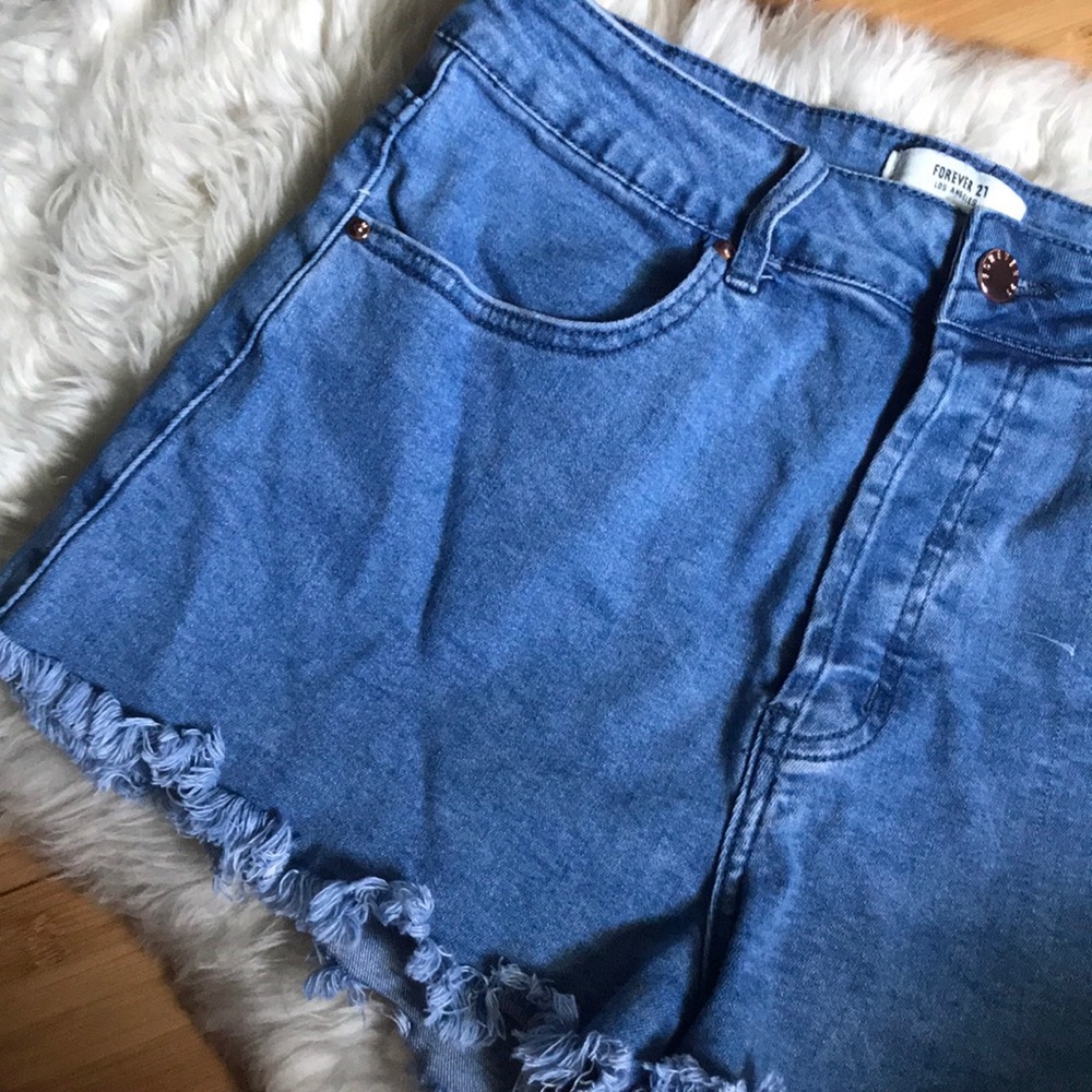 Blue denim fringe-style shorts